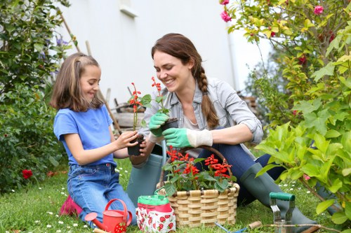 Trained gardener demonstrating safe mower operation